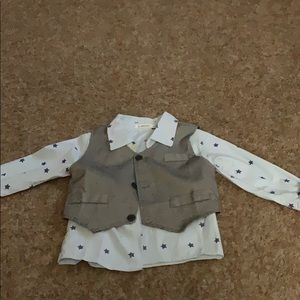 A blue star dress up shirt and vest